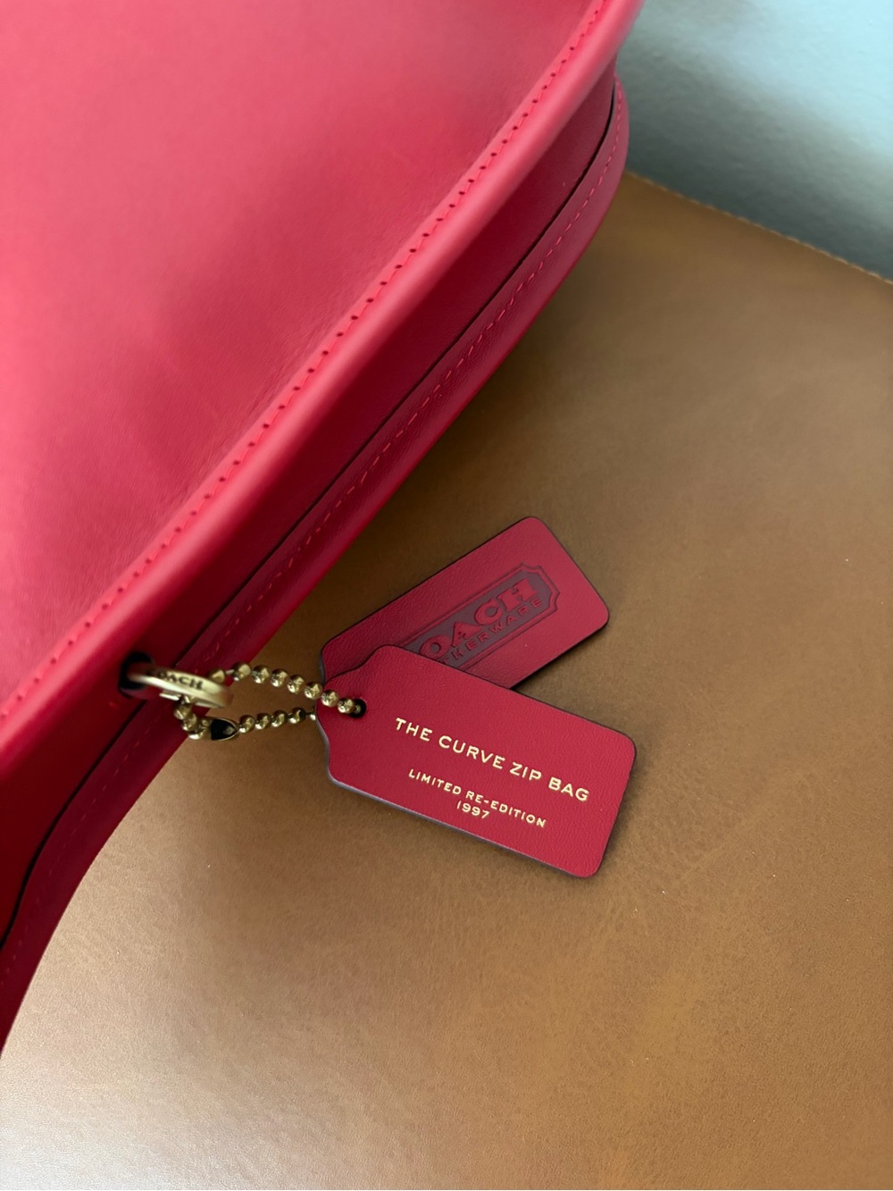 NWOT Coach Curve Zip Reedition in Ruby - Picture 3 of 7